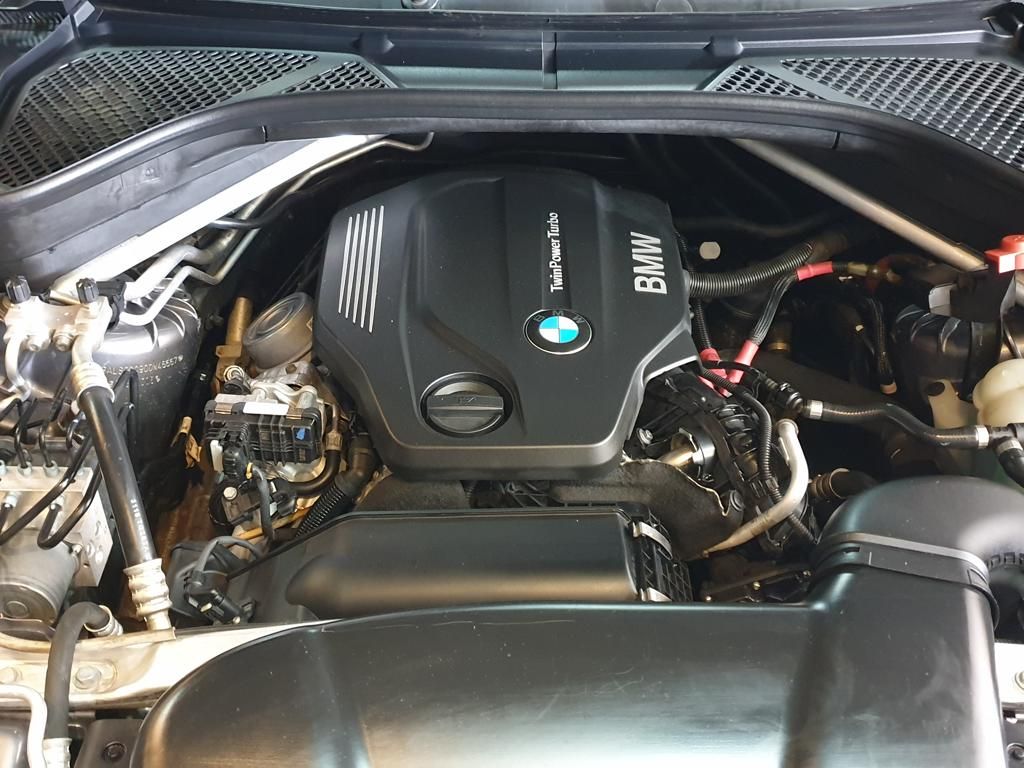 BMW TwinPower Turbo engine compartment with visible engine cover
