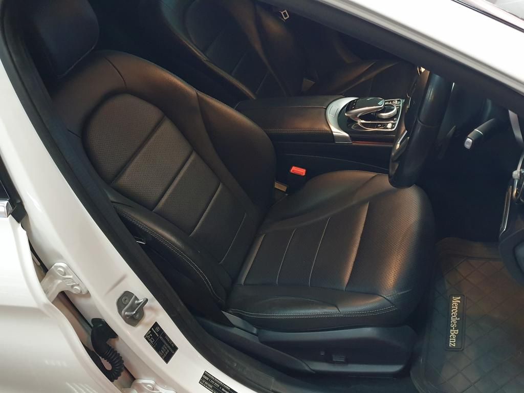 Luxury Mercedes-Benz car interior with black leather front seats