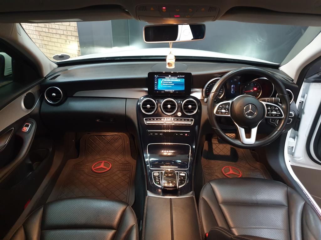 Mercedes-Benz car interior with leather seats and dashboard