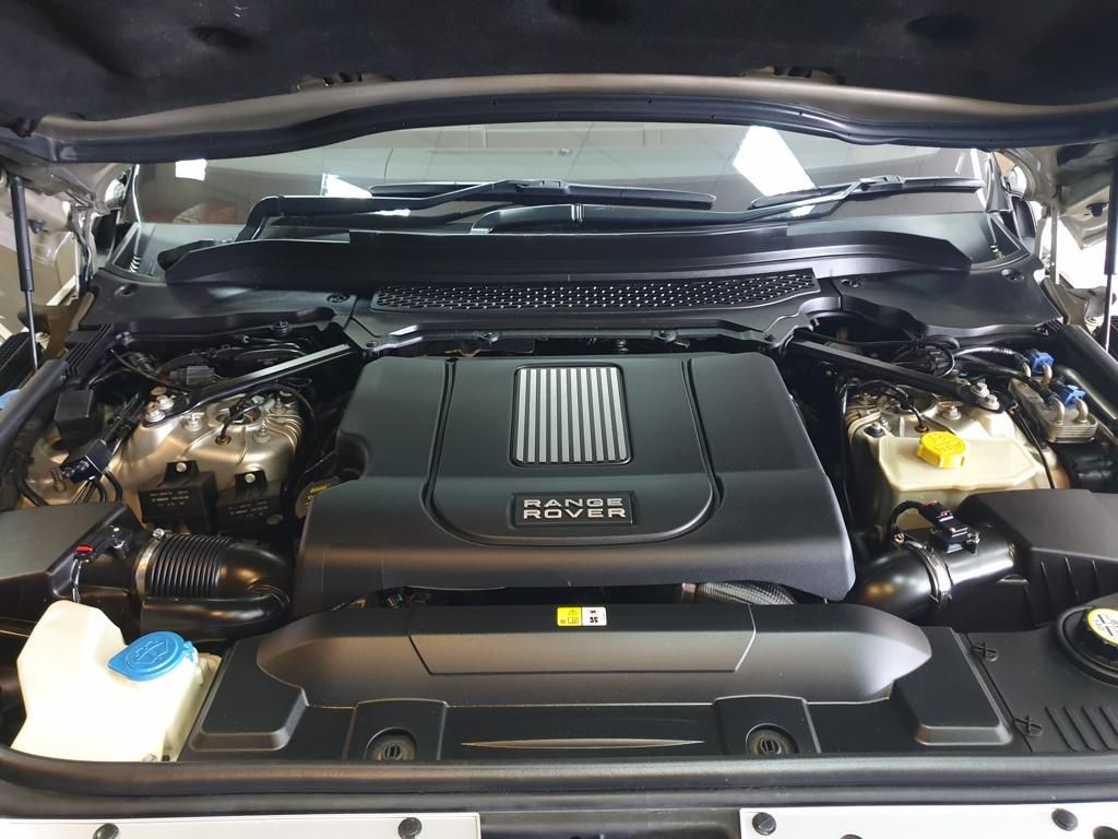 Range Rover engine compartment with visible engine cover